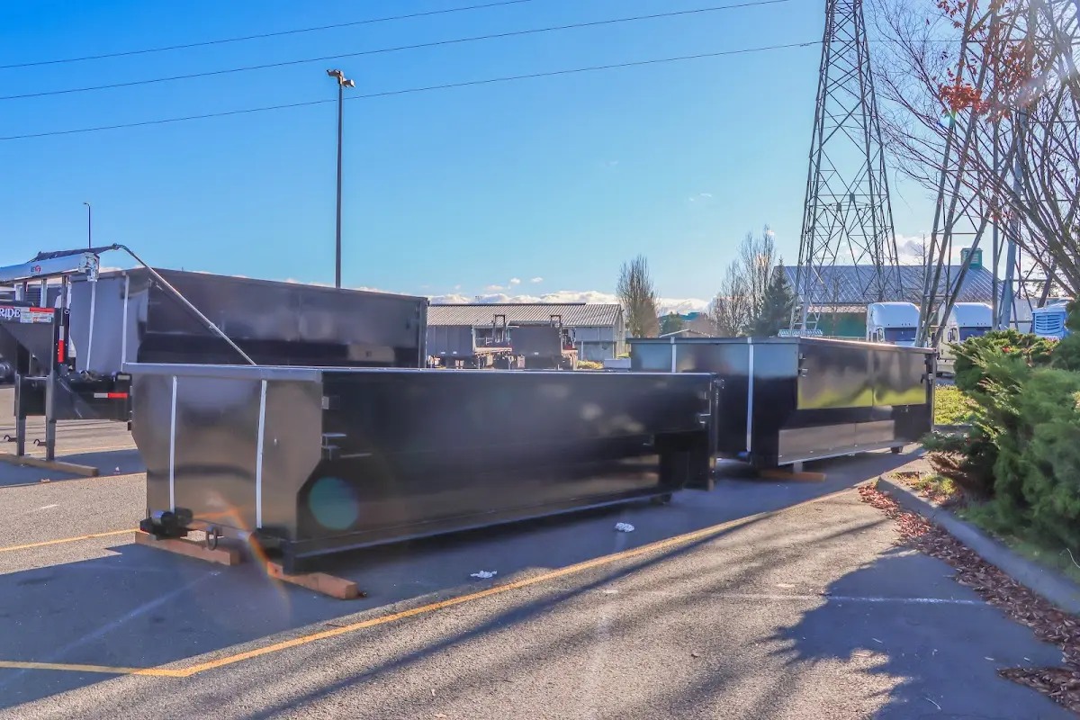 Roll-off dumpster ready for waste disposal at job site for Demolition Dumpster Rental in Turpin Hills